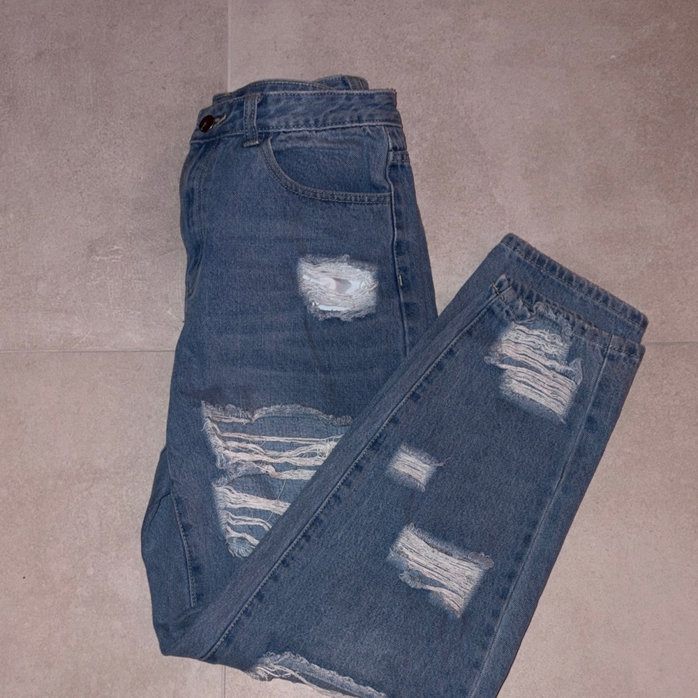 Distressed Blue Jeans